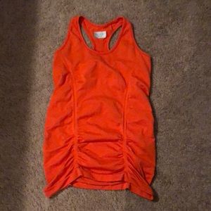 Neon orange Athleta tank.
